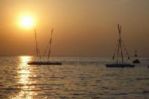 Algarve sunset over sail boats