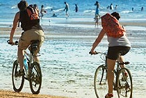 Cycling on the beach in the Algarve